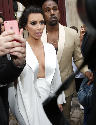 Kim and Kanye leaving their hotel for versailles's castel reception